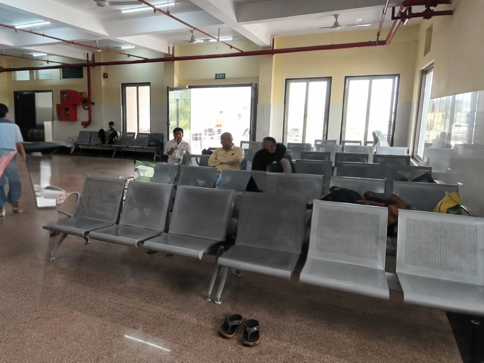 Patients seated in the hospital waiting area